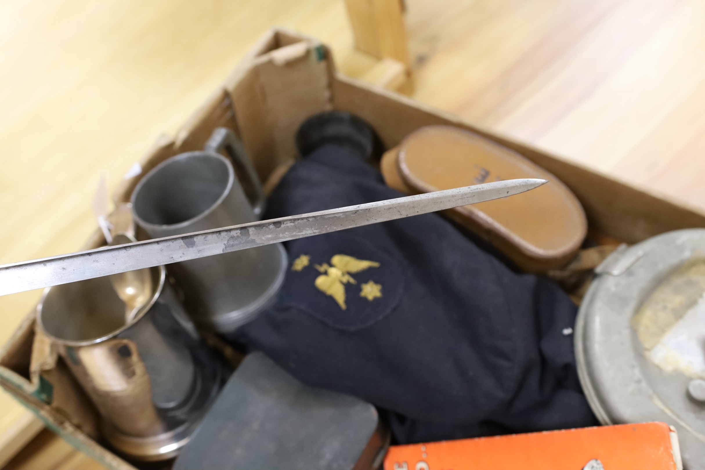 A box of militaria items
